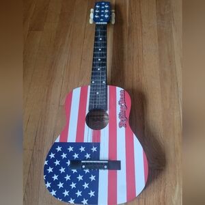 The Rolling Stones Gold Label Kids Beginner Acoustic Guitar.